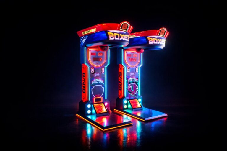two glowing boxing arcade machines in a dark environment with neon lights